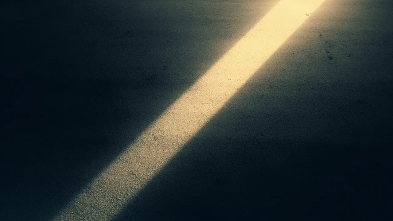 Um raio de luz suave cortando um ambiente escuro, simbolizando clareza em meio à confusão diagnóstica.